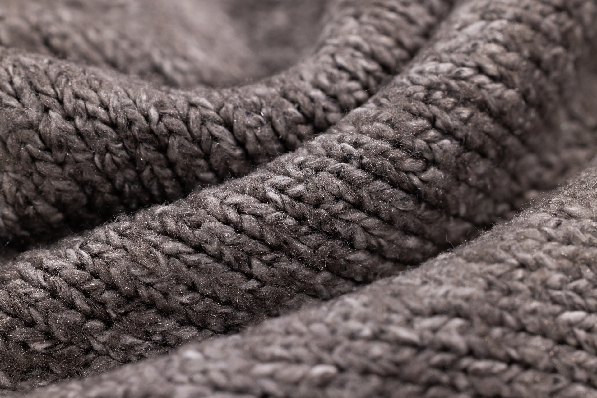 Close up on grey knit jumper